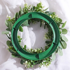 Nordic artificial eucalyptus wreath with green leaves and a durable circular frame base