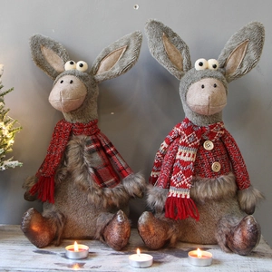 Adorable Christmas reindeer plush doll set featuring cozy scarves and festive knit sweaters