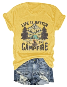 Detailed view of campfire graphic and Life Is Better text on yellow cotton T-shirt