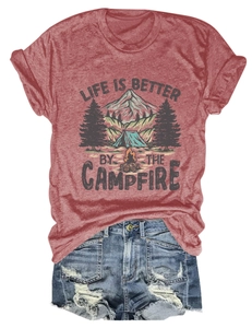 Detail of brick red cotton t-shirt with campfire print and frayed denim shorts set