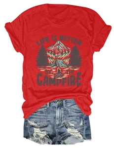 Detail of red campfire graphic t-shirt showing cotton texture and outdoor camping print