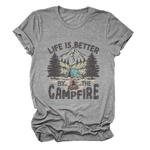 Detail of campfire and mountain print on grey cotton t-shirt with retro lettering