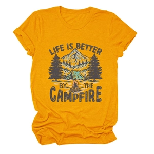 Detail of life is better by the campfire text and camping graphic on yellow cotton t-shirt
