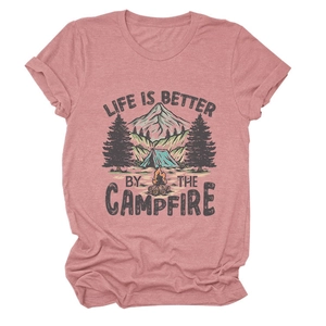 Detail of campfire print on rose pink crew neck T-shirt with mountains and trees