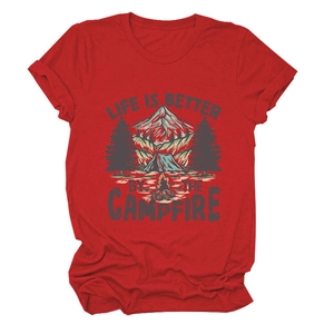 Detailed flat lay of a red cotton t-shirt featuring a campfire and mountain graphic print