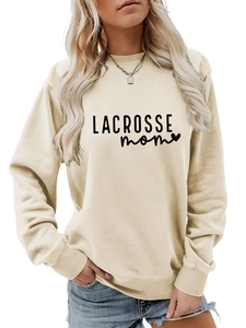 Detailed view of the ribbed cuffs and soft cream fabric on the Lacrosse Mom sweatshirt