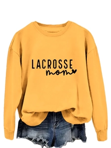 Close-up of bright yellow lacrosse mom sweatshirt with crew neck and ribbed cuffs
