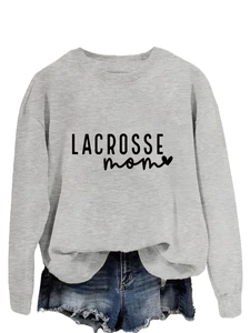 Close-up of Lacrosse Mom graphic on grey sweatshirt with ribbed crew neck details
