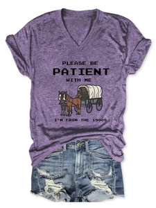 Detail of V-neck heather purple T-shirt with vintage pixel text and denim shorts set