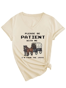Close-up of beige V-neck T-shirt featuring vintage carriage print and tied hem detail