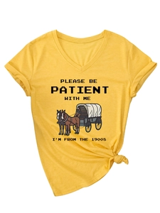 Macro view of retro yellow V-neck T-shirt showing sleeve roll and high-quality cotton fabric