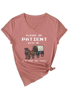 Close-up of V-neck dusty pink cotton T-shirt with vintage carriage print and tied hem detail