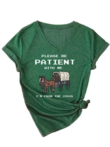Detail of V-neck dark green heather T-shirt featuring vintage carriage graphic and text