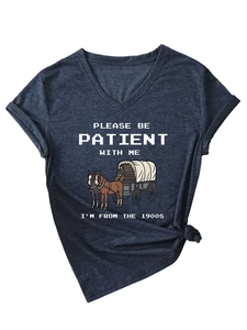 Detail of navy V-neck tee with PLEASE BE PATIENT WITH ME I'M FROM THE 1900S print