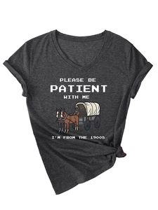 Detail of V-neck grey t-shirt with Please Be Patient 1900s print and knotted hem