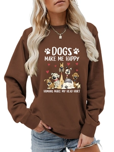Détail du sweat marron Dogs Make Me Happy avec des illustrations de chiens de dessin animé