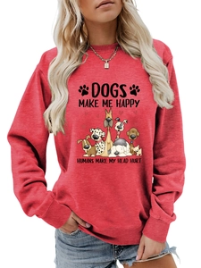 Détail du sweat rouge avec slogan 'Dogs Make Me Happy' et imprimé de chiens cartoon