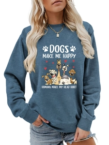 Détail du texte Dogs Make Me Happy et imprimé chiots sur le sweat-shirt bleu marine