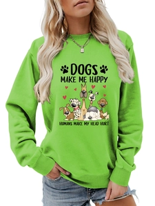 Détail du sweat vert Dogs Make Me Happy avec graphismes de chiens et texte imprimé