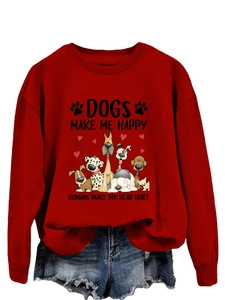 Détail du sweat-shirt rouge avec graphique de chien de dessin animé et texte anglais