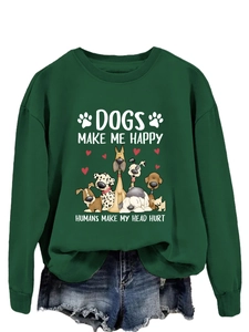 Détail du sweat vert foncé avec motifs de chiens et impression Dogs Make Me Happy