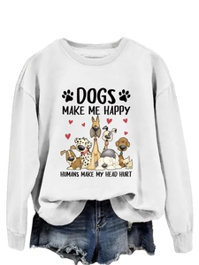 Détail d'un sweat blanc avec chiens de dessin animé et texte humoristique imprimé