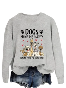 Détail du sweat gris à col rond avec chiens de dessin animé et slogan humoristique imprimé