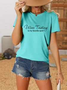Close-up of Wine Tasting is my favorite sport printed text on teal crew neck t-shirt