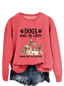 Détail du sweat-shirt rose corail avec imprimé chien et texte humoristique en coton