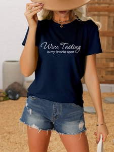 Detail of navy cotton T-shirt featuring Wine Tasting is my favorite sport white typography