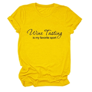 Detail of Wine Tasting is my favorite sport slogan on a yellow cotton t-shirt