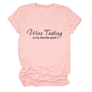 Detail of pink cotton T-shirt showing rolled sleeves and Wine Tasting slogan print