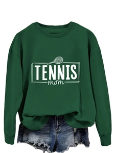 Close-up of the Tennis Mom print and ribbed cuff detail on this dark green crewneck sweatshirt