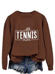 Detail of tennis mom print on a brown crewneck sweatshirt with ribbed cuffs and hem