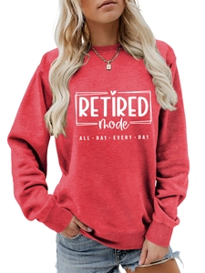 Detail of red crewneck sweatshirt with Retired Mode All Day Every Day white text print