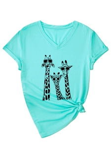 Detail of mint green V-neck T-shirt with giraffe print and stylish front knot detail