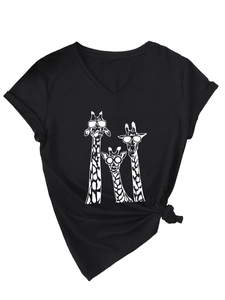 Detail of V-neck black T-shirt with giraffe graphic and stylish front tie knot design