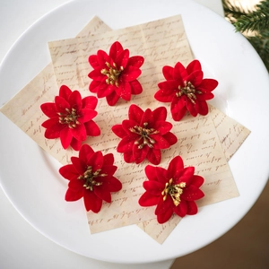 Set of six red velvet artificial Christmas flowers with gold glitter in ceramic plate