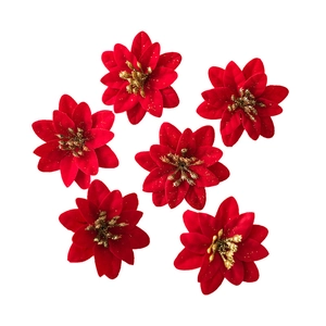 Set of six red velvet artificial poinsettia flowers with gold glitter centers for decor