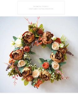 Close-up of caramel peony and rose wreath with realistic autumn maple leaves and textures