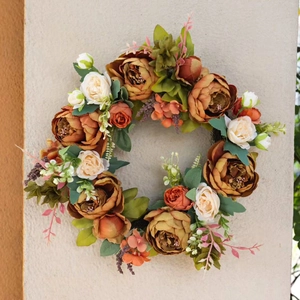 Autumn peony and rose wreath with maple leaves and berries for home door decoration