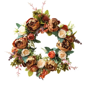 Autumn peony wreath with vintage caramel blooms and maple leaves for home wall decoration