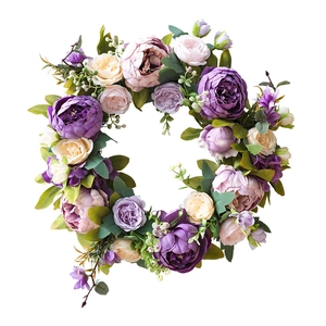 European vintage artificial peony wreath with multi-colored flowers and lush green leaves