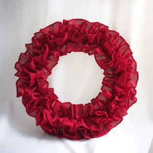 Red ruffled burlap wreath decoration for home wall hanging with layered texture