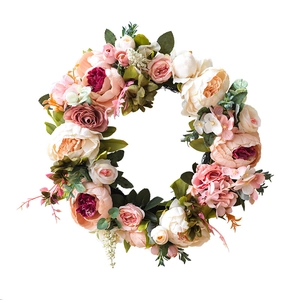 Pink and cream peony floral wreath with lush green leaves for home wall door decoration