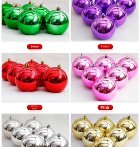 Close-up of vibrant mirror-polished Christmas baubles in multiple festive colors with ropes