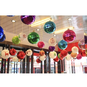 Assorted Christmas ball ornaments with shiny metallic finishes and festive painted patterns