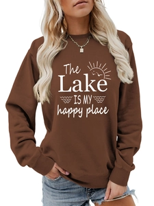Detail of The Lake Is My Happy Place print on coffee brown long sleeve sweatshirt