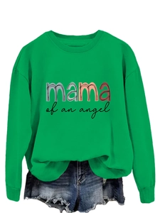 Gros plan du sweat-shirt vert vif avec texte imprimé coloré mama of an angel