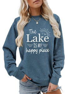 Detail of the lake is my happy place print and ribbed cuffs on blue sweatshirt